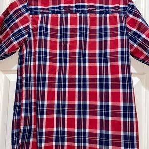 Button down young boys shirt.